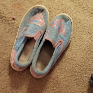 Blue Supergirl shoes with white pocodots